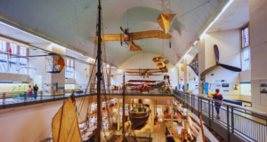 Virtual Conference: Museum Learning Summit 2024 View from above of a history museum filled with artifacts.