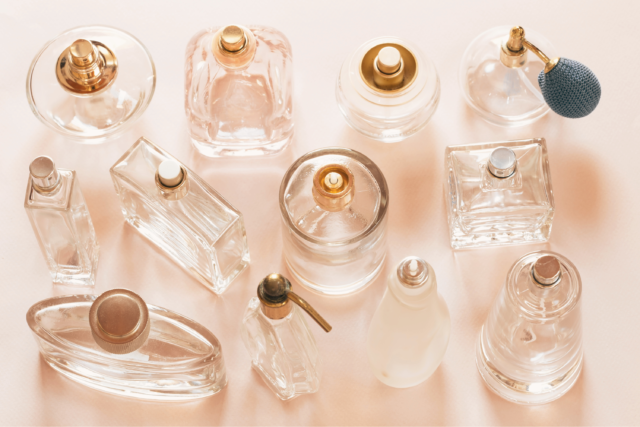 Collection of a variety of empty perfume bottles