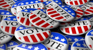 September 17 | Webinar: Voter Registration & Engagement 101 for Museums Pile of U.S. election pins that say "VOTE"