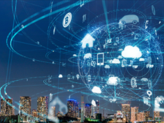 Exploring the Best IoT Devices for Smarter Museum Operations A city skyline at night overlayed with a rendering indicating IoT data collection