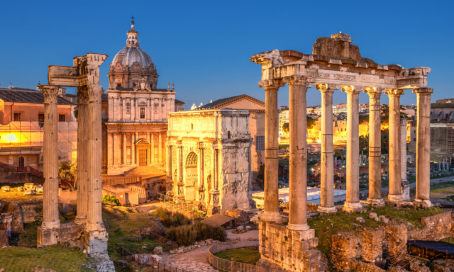 Roman Forum ruins lit up at night