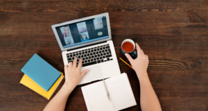 January 28 – 29 | Virtual Summit: Activating Environmental Care and Strength at Museums and Historic Sites View from above of a person at a laptop with a notebook and a cup of coffee