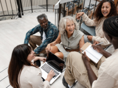 Engaging Older Adults: Successful Museum Programs That Combat Social Isolation and Ageism Diverse group of people sitting on stairs having a meeting