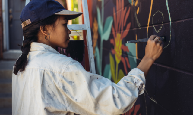 Mural artist at work