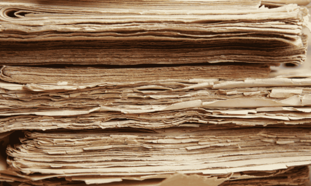 close up of a stack of old archival papers