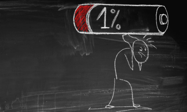 chalkboard drawing of a stick figure carrying a battery that only has 1% charge remaning