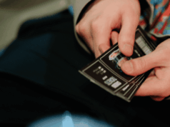 Comparing Museum Admission Prices Around the U.S. by Type of Museum close-up of hands holding admission tickets