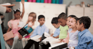 May 21 – 22 | Virtual Conference: Museums & Public Programs Summit a row of small children sitting in chairs and holding notebooks