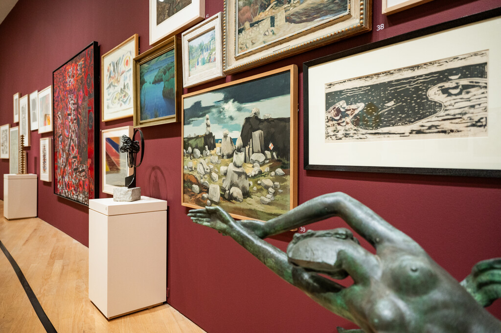 wall of various artworks at OKCMOA From the Vault exhibition