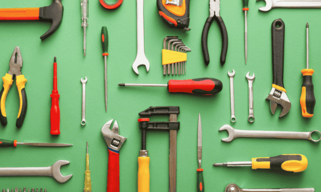 view from above of assorted construction tools, neatly arranged