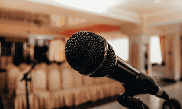 close-up of a microphone in an empty conference hall