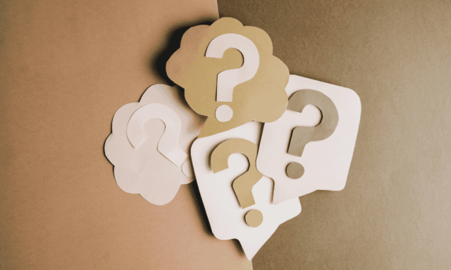 graphic of thought and speech bubbles with question marks in them