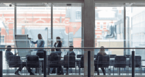 Targeted Tips for Recruiting New Museum Board Members view of a boardroom through glass windows