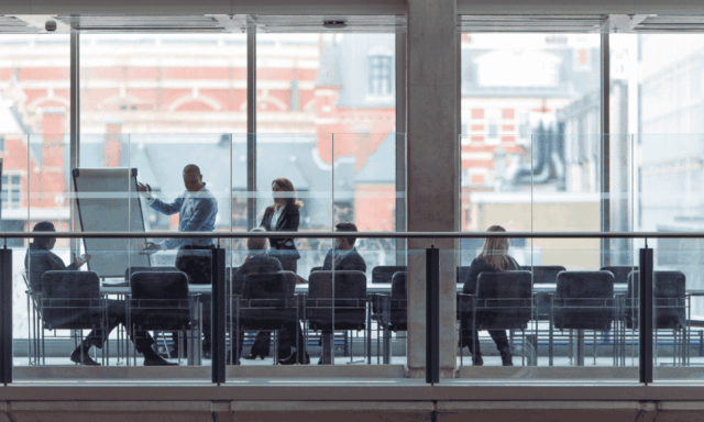 view of a boardroom through glass windows