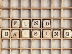 5 Museum Fundraising Success Stories and Inspiration Wood blocks spelling out Fundraising on a wooden shelf