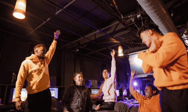 group of guys celebrating/cheering