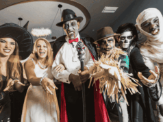 Discover Creative Halloween Programming at Museums in 2025 A group of adults in Halloween costumes
