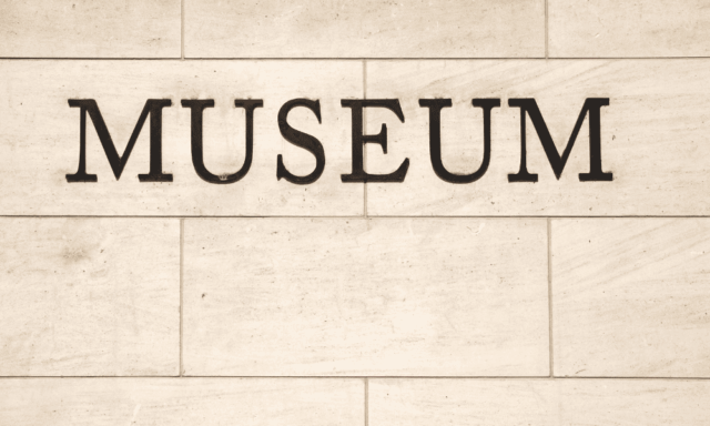 Letters on a wall spelling out museum