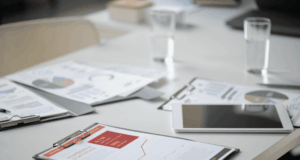 February 3 | Advocacy in Turbulent Times meeting table with papers and a tablet