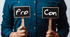 Before You Commit: Questions To Ask Before Partnering With a Sponsor man holding up little pro and con signs.