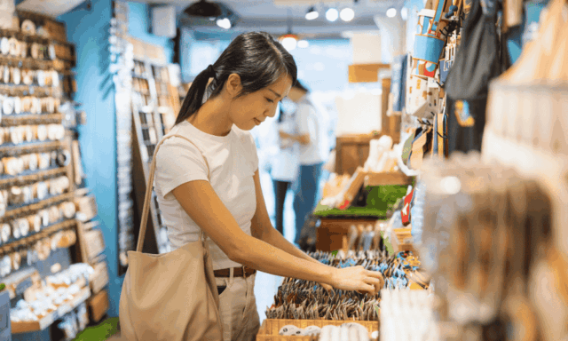 woman browsing items in a gift shop